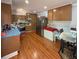 Spacious kitchen with a stainless steel refrigerator, and dining table at 724 Camelot Way, Norcross, GA 30071
