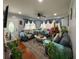 Cozy living room features a comfortable gray sectional sofa and natural light at 724 Camelot Way, Norcross, GA 30071