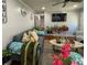 Inviting living room featuring a gray sectional sofa, stylish decor, and a ceiling fan at 724 Camelot Way, Norcross, GA 30071