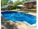 Enjoy this luxurious pool that has an umbrella and lounge chairs. Enjoy the summer heat! at 724 Camelot Way, Norcross, GA 30071