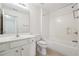 Bright bathroom featuring a vanity, toilet, and shower/tub combination at 1410 Bluestone Dr, Cumming, GA 30041
