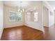 Cozy dining room featuring hardwood floors and natural light, creating an inviting atmosphere for meals at 1410 Bluestone Dr, Cumming, GA 30041