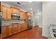 Well-equipped kitchen with stainless steel appliances, granite countertops, and ample cabinet space at 1410 Bluestone Dr, Cumming, GA 30041