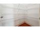 Well-organized walk-in pantry with multiple shelves for ample storage at 1410 Bluestone Dr, Cumming, GA 30041
