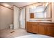 Bathroom features a toilet, double sink vanity, and corner bathtub at 1530 Mcbrayer Rd, Temple, GA 30179