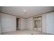 Bedroom with mirrored closet doors, and neutral color scheme at 1530 Mcbrayer Rd, Temple, GA 30179