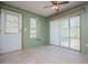 Bright dining area with natural light from a large window and sliding glass door to the backyard at 1530 Mcbrayer Rd, Temple, GA 30179