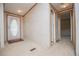 Clean entryway with neutral walls, and a charming front door creating an inviting entrance to the home at 1530 Mcbrayer Rd, Temple, GA 30179