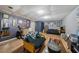 Finished basement area with vinyl floors, a comfortable sofa, and entertainment center at 165 Holly Ct, Loganville, GA 30052
