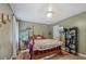 Comfortable bedroom with dark wood floors, and a comfortable bed at 165 Holly Ct, Loganville, GA 30052