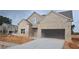 Charming single-story brick home featuring a two-car garage and inviting entrance at 3708 Southfield Ct, Loganville, GA 30052