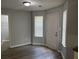 Inviting living room with new vinyl floors, fresh paint and ample natural light at 4817 Hidden Creek Place, Decatur, GA 30035