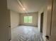 Bright bedroom with big window offers natural light and beautiful outdoor views at 1005 Liberty Springs Dr, Woodstock, GA 30188