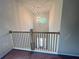 Bright foyer with modern chandelier and railing at 1005 Liberty Springs Dr, Woodstock, GA 30188