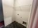 Laundry room features black herringbone tile flooring and wire shelving at 1005 Liberty Springs Dr, Woodstock, GA 30188