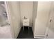 A bright white laundry sink on legs is tucked away at 1005 Liberty Springs Dr, Woodstock, GA 30188