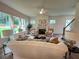 Inviting living room with a fireplace, comfortable seating, and large windows with natural light at 1005 Liberty Springs Dr, Woodstock, GA 30188
