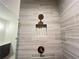 Modern shower with tile walls and a built-in niche for toiletries, combining style and functionality at 1005 Liberty Springs Dr, Woodstock, GA 30188