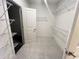 A walk-in closet equipped with installed wire shelving and bright neutral paint at 1005 Liberty Springs Dr, Woodstock, GA 30188