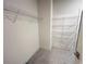 Spacious walk-in closet equipped with installed wire shelving for optimal storage and organization at 1005 Liberty Springs Dr, Woodstock, GA 30188