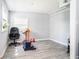 Large living room with light gray vinyl floors, lots of natural light, and plenty of space at 4135 Brenda Dr, Decatur, GA 30035
