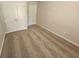 This cozy bedroom has two closets, neutral walls, and soft carpet at 4316 Sw Notting Hill Sw Dr, Atlanta, GA 30331
