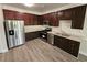 Well-equipped kitchen with stainless steel appliances, granite countertops, and ample cabinet space at 4316 Sw Notting Hill Sw Dr, Atlanta, GA 30331