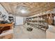 Utility basement with shelving and workbench perfect for storage and workshop activities at 4790 Hyde Rd, Cumming, GA 30040