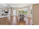 Charming breakfast nook with hardwood floors, backyard views, and adjacent living area at 4790 Hyde Rd, Cumming, GA 30040