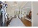 Inviting foyer with hardwood floors, detailed trim, and views into formal dining and living areas at 4790 Hyde Rd, Cumming, GA 30040