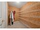 Well-organized walk-in closet with ample shelving and hanging space, perfect for storage at 4790 Hyde Rd, Cumming, GA 30040