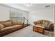 Bonus room with comfortable seating and a treadmill at 4459 Sierra Creek Dr, Hoschton, GA 30548