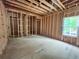 Spacious bedroom being built, showcasing a window view of the outside at 1025 Liberty Springs Dr, Woodstock, GA 30188