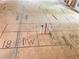 Kitchen layout marked on the floor for the countertop, dishwasher, and sink of the kitchen at 1025 Liberty Springs Dr, Woodstock, GA 30188