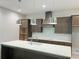 Beautiful kitchen showcasing custom cabinetry, a kitchen island, modern appliances, and stylish pendant lighting at 1025 Liberty Springs Dr, Woodstock, GA 30188