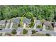 Aerial view showing the home's location within a neighborhood with mature trees at 1263 Whisperwood Ln, Lawrenceville, GA 30043