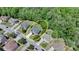 Bird's eye view of home surrounded by trees and other houses in neighborhood at 1263 Whisperwood Ln, Lawrenceville, GA 30043