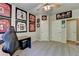Inviting carpeted bedroom featuring sports memorabilia, desk, and ample closet space at 1263 Whisperwood Ln, Lawrenceville, GA 30043