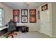 Bedroom with a desk, framed jerseys, and natural light from the window at 1263 Whisperwood Ln, Lawrenceville, GA 30043