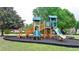 Community playground featuring slides, climbing areas, and safety surfacing for hours of outdoor fun and recreation at 1263 Whisperwood Ln, Lawrenceville, GA 30043
