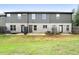 Townhome backyard with a small patio and a fenced in yard that's ready for pets at 137 White Mountain Pass, Mcdonough, GA 30252
