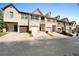 Charming townhomes featuring private garages and attractive architectural details at 137 White Mountain Pass, Mcdonough, GA 30252