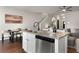 Bright kitchen with granite counters and stainless steel dishwasher at 137 White Mountain Pass, Mcdonough, GA 30252