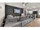 Open-concept living area with hardwood floors and accent wall at 137 White Mountain Pass, Mcdonough, GA 30252