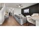 Modern living room showing hardwood floors and an open concept floor plan at 137 White Mountain Pass, Mcdonough, GA 30252