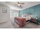 Spacious main bedroom with a modern accent wall, plush bed, and soft lighting at 137 White Mountain Pass, Mcdonough, GA 30252