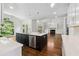 Gourmet kitchen featuring a large island, stainless steel appliances, and an open concept design at 2160 Waters Ferry Dr, Lawrenceville, GA 30043