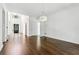 Living room featuring beautiful hardwood floors, soaring ceilings, and an open layout at 2160 Waters Ferry Dr, Lawrenceville, GA 30043