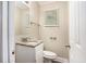 Cozy bathroom with a stone countertop and updated fixtures at 310 Oak Se Dr, Atlanta, GA 30354