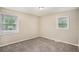 Neutral bedroom with large windows and natural light to enjoy the outdoors at 310 Oak Se Dr, Atlanta, GA 30354